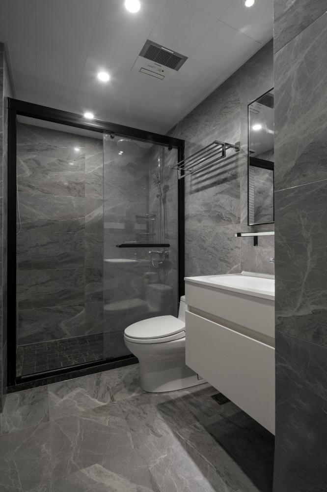 灰色系加工砖上墙简约大气再配合白色浴室柜使空间更加分明有层次感