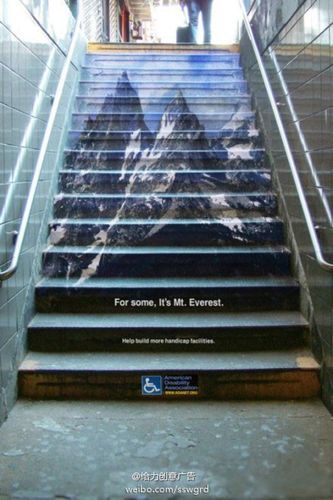 楼梯上的公益广告对于有些人来说这就是珠穆朗玛峰请关爱残障人士