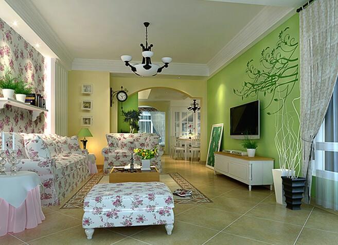 绿色的电视墙对应着白色印花墙将整个客厅春意盎然再加上些许绿色
