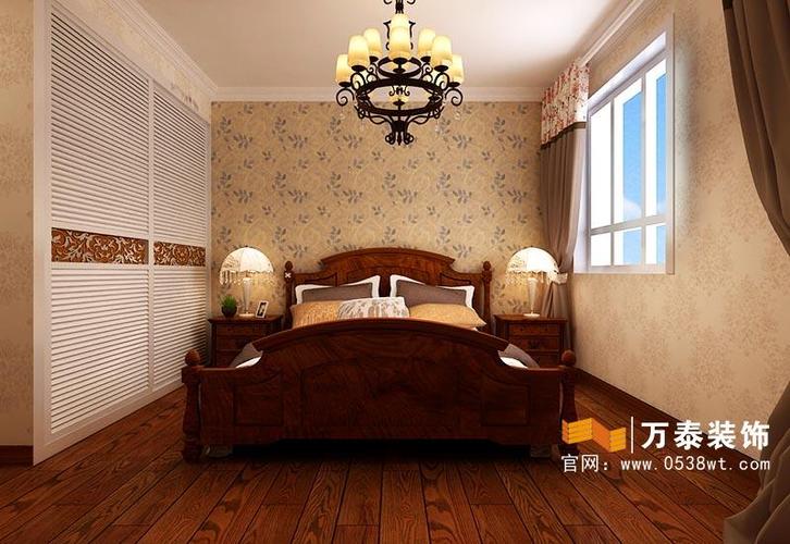 卧室使用了深色的木地板大气稳重.泰安新兴园卧室装修效果图.