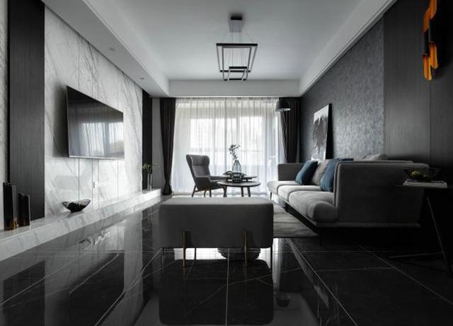 整个房间以黑白灰作为基调质感和层次感更加深厚黑白根瓷砖的采用