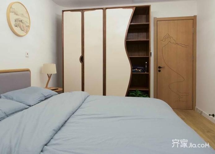 主卧墙角处理成圆弧形增加了卧室的违和感更加温馨安全舒适搭配的