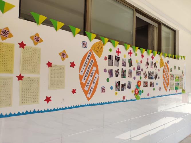 营造文化气息打造美丽校园记禾源中心小学班级走廊文化墙布置