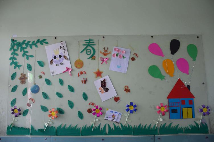 大家齐动手一起布置主题墙让春天住进我们的幼稚园让孩子从身边
