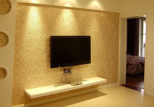 案例名称李小姐家的真石漆电视背景墙