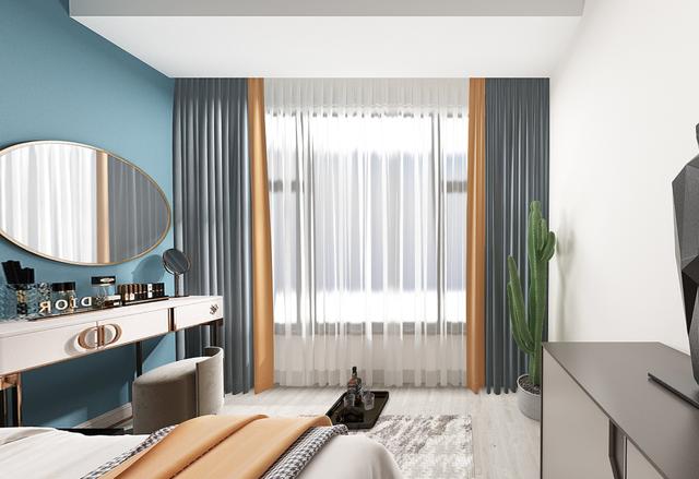 卧室的湖蓝的背景墙与窗帘同一个色调