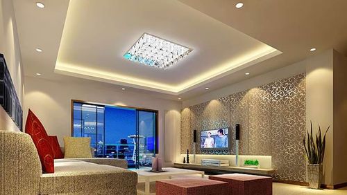 现代的装修风格采用玻璃与金属材料做电视背景墙能给居室带来很强的