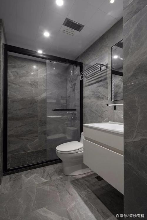 灰色纹路的大理石瓷砖通铺整个卫生间做了干湿分离再搭配白色的浴室