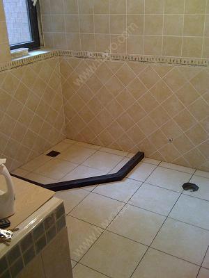 装修卫生间装好后发现挡水条贴错了得把淋浴间砖敲了重做请问需要