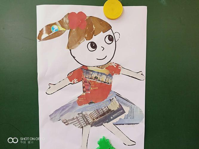 童乐幼儿园中一班撕纸粘贴《跳舞的娃娃》
