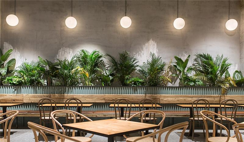 绿色植物环绕的泰式茶餐厅装修设计郑州专业餐厅装修
